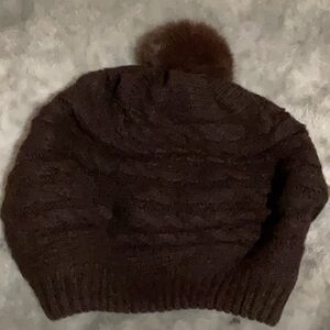 Winter hat with pompom padded brown